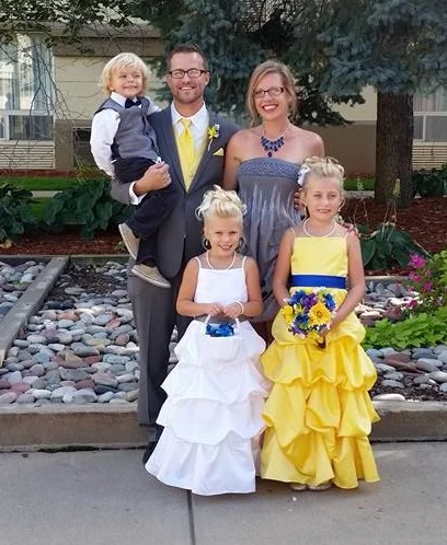 Ashley Robillard, with her husband, two daughters and son.