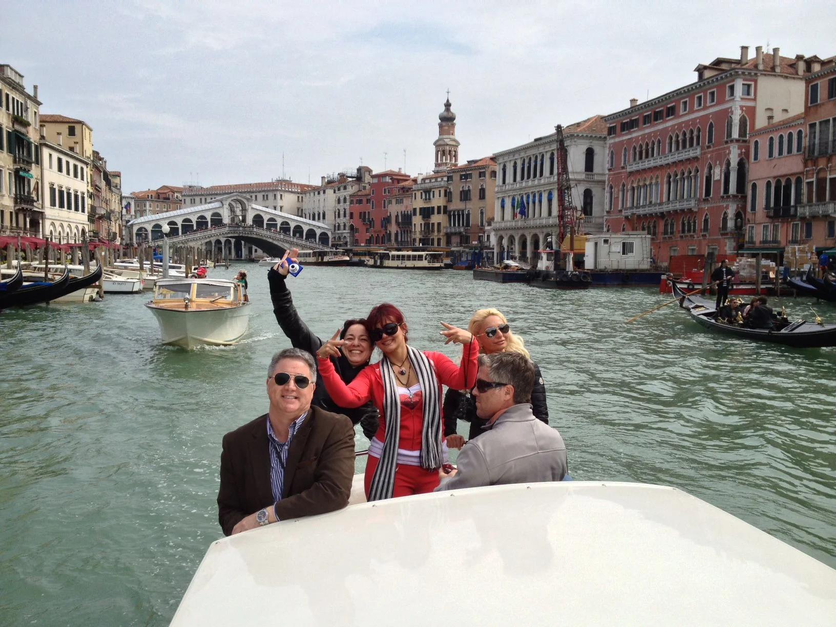 The Gang! On a water Taxi in t e canals of Venice.