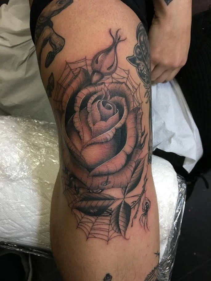 Big-Steve-Tattoos-Rose-and-Cobwebs.jpg