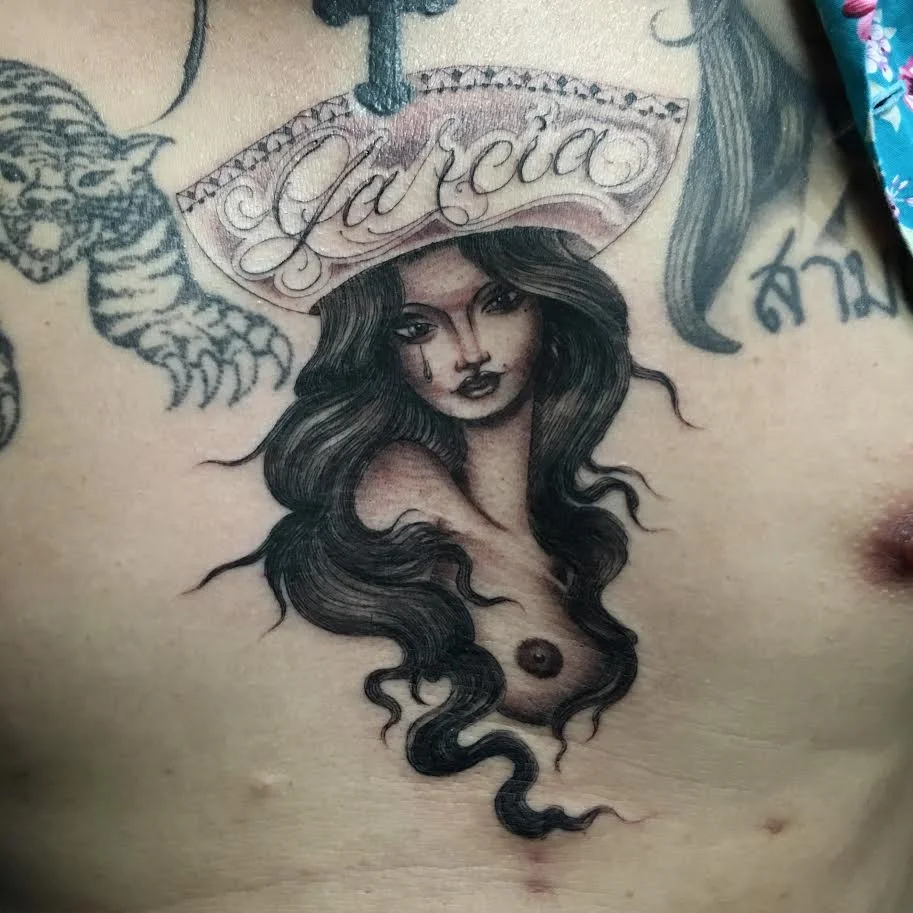 Big-Steve-Tattoos-Lady-and-Script.jpg