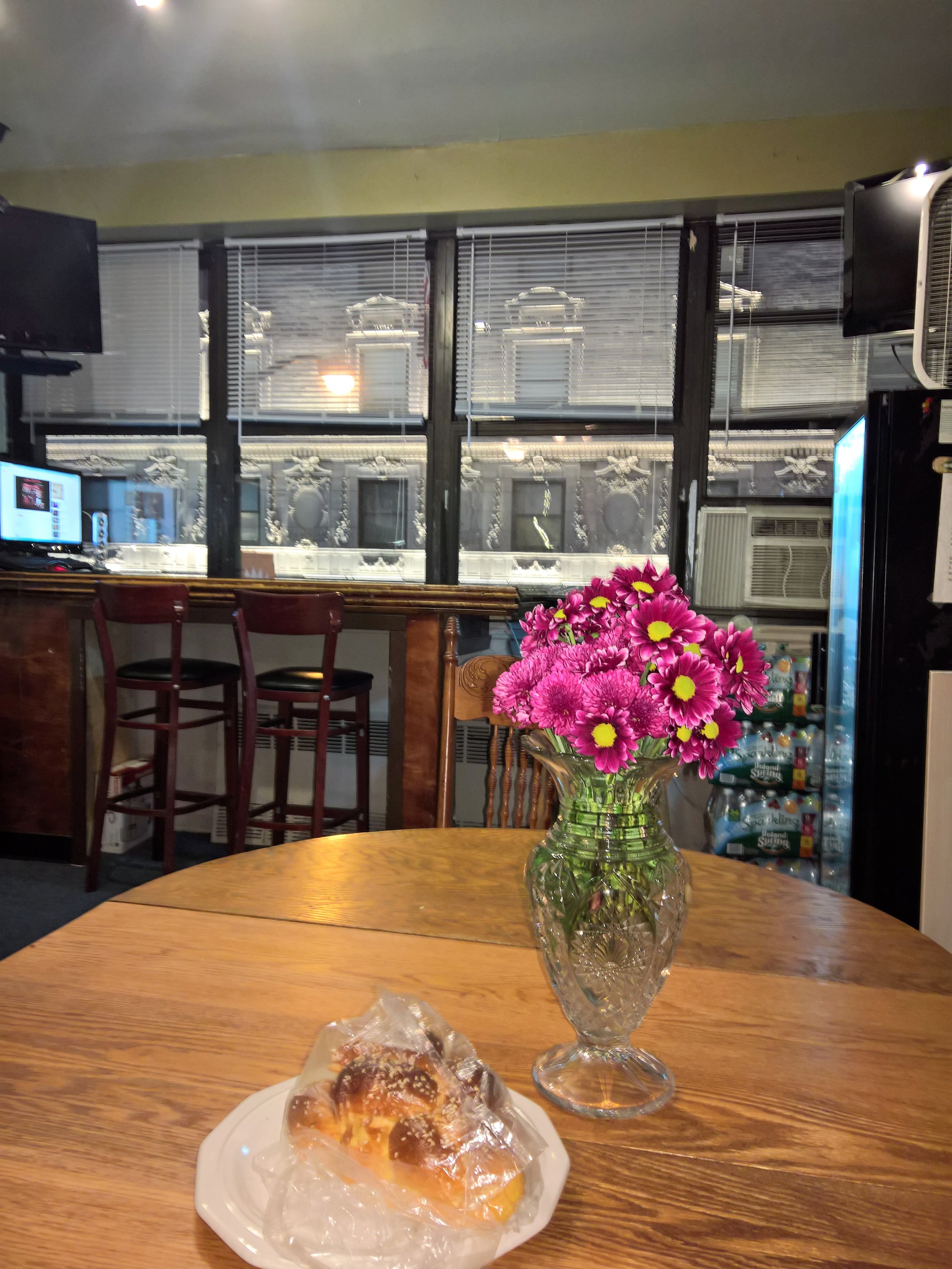 46th_street_clubhouse_door_table_with_flowers.jpg