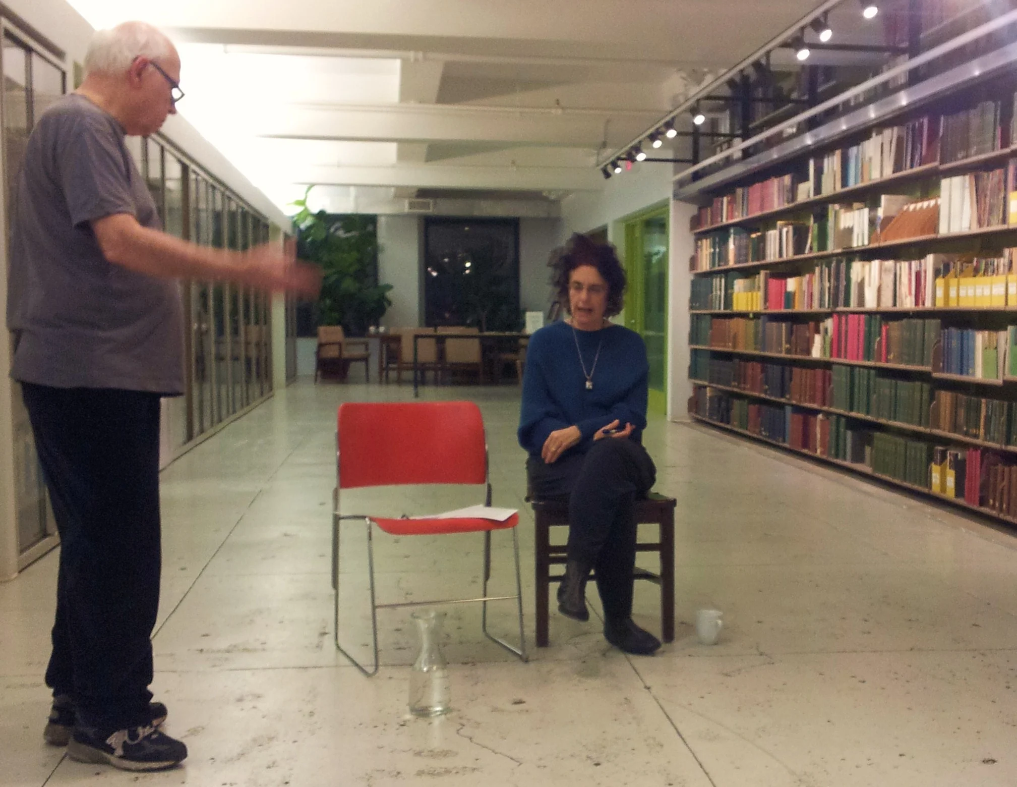 George Bartnieff giving directions to Karen Malpede at the first reading of Extreme Whether, NY Horticulture Society, Dec. 2012. photo: Soraya Bourkhim