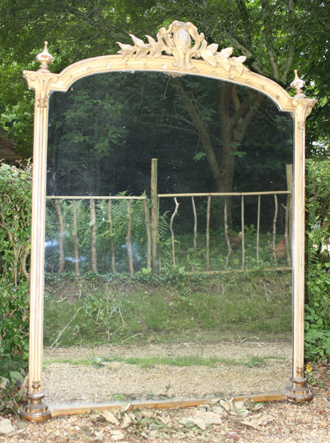 Reflected glory. A grandiose Victorian overmantel mirror in its original gilded opulence.