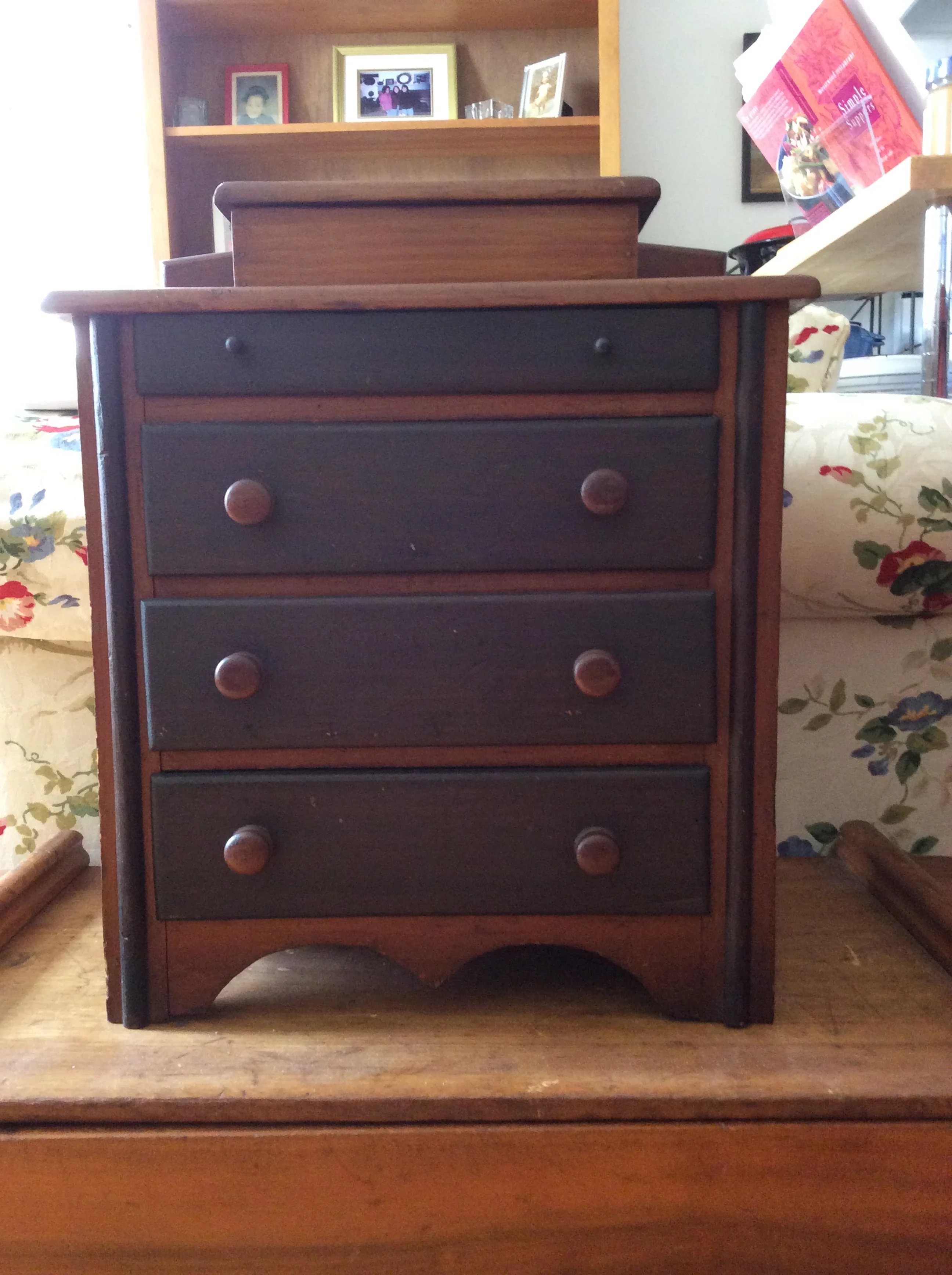 Miniature 4-drawer chest with hinged top well, great example of a highly collectible form. $1000 estimated value