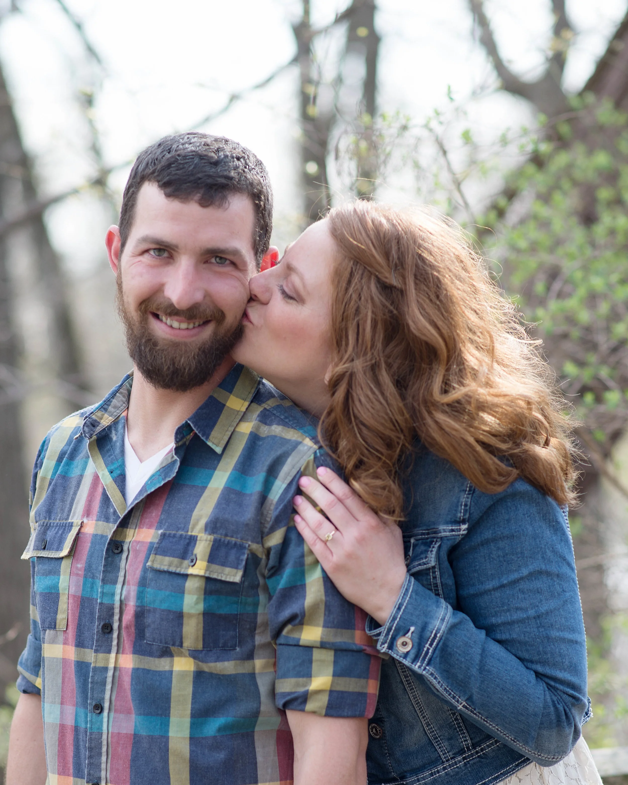 Wooded Spring session including blended family and lots of love. Making your engagement session special by bringing your children too!