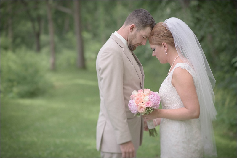 M & P in prayer before their wedding in Kingston, IL. 