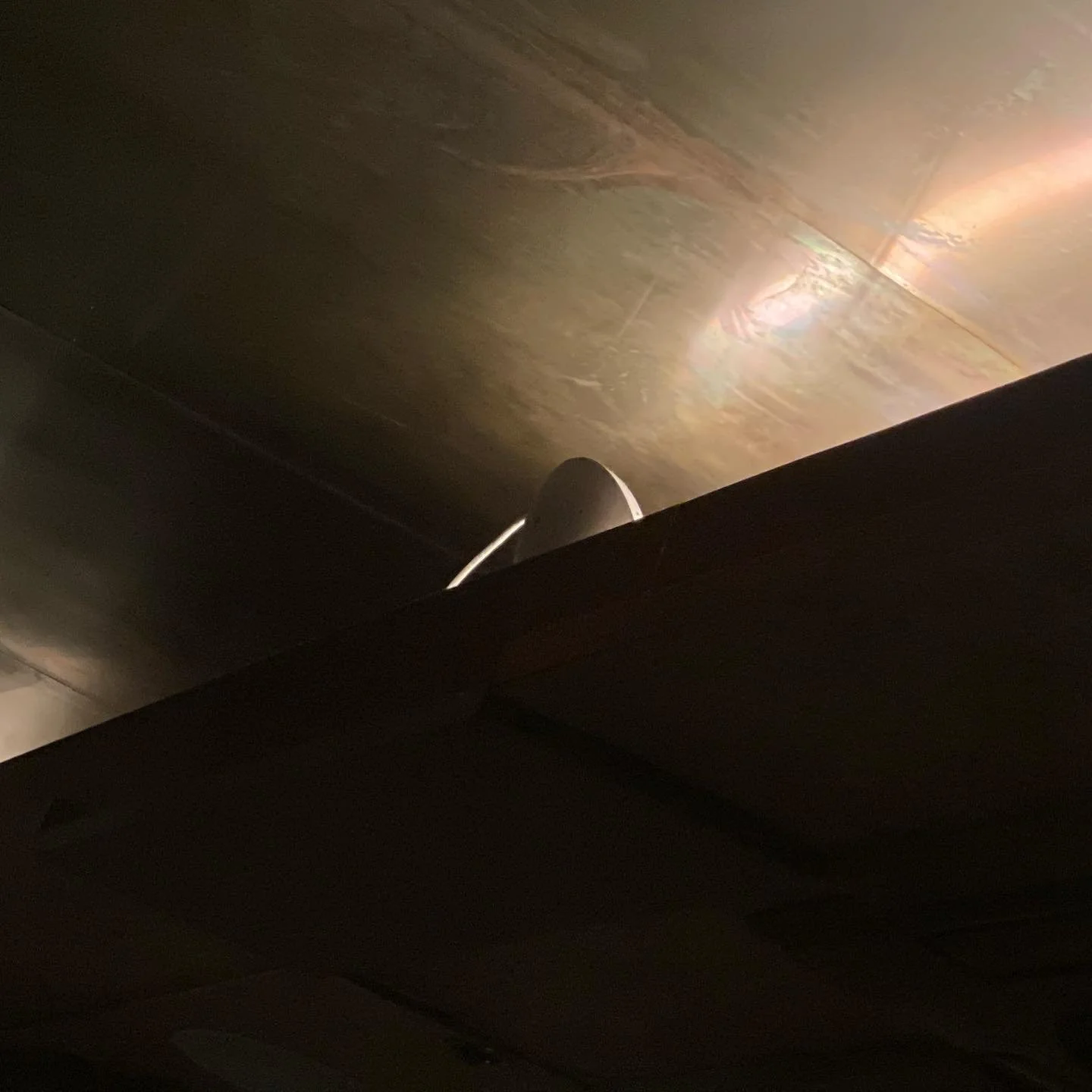 A unifi WAP peeking out behind the lighting cove and blasting the tin ceiling. Ambiance. #findthewap