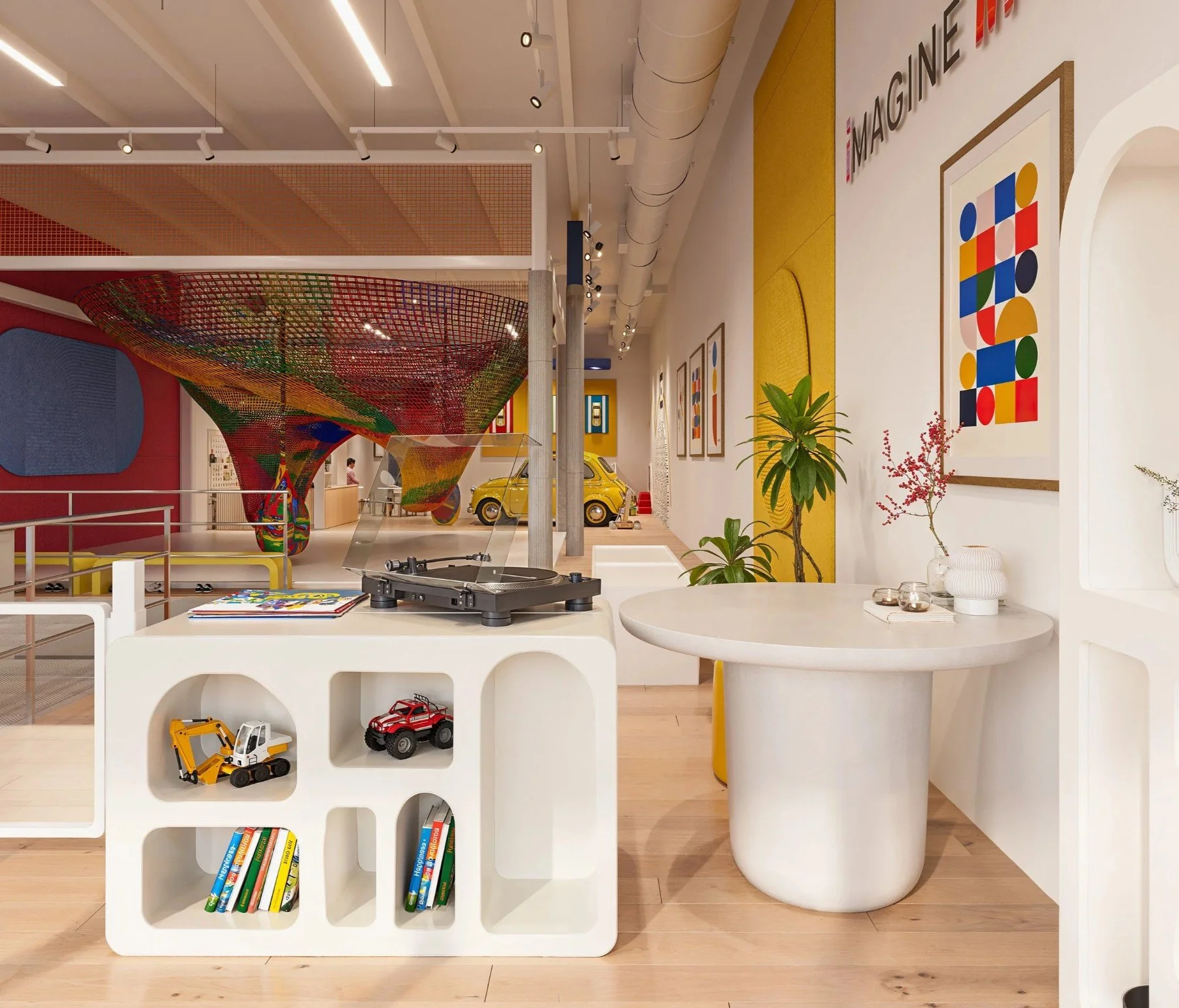 Interactive children’s museum-style environment at Imagine Minds with construction toys, creative displays, furniture, and hands-on play experiences.