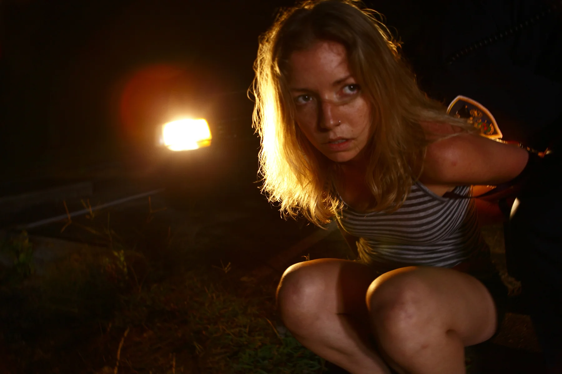 *1_Jackie (Lacy Marie Meyer) is arrested in 2014's SUCK IT UP BUTTERCUP.jpg