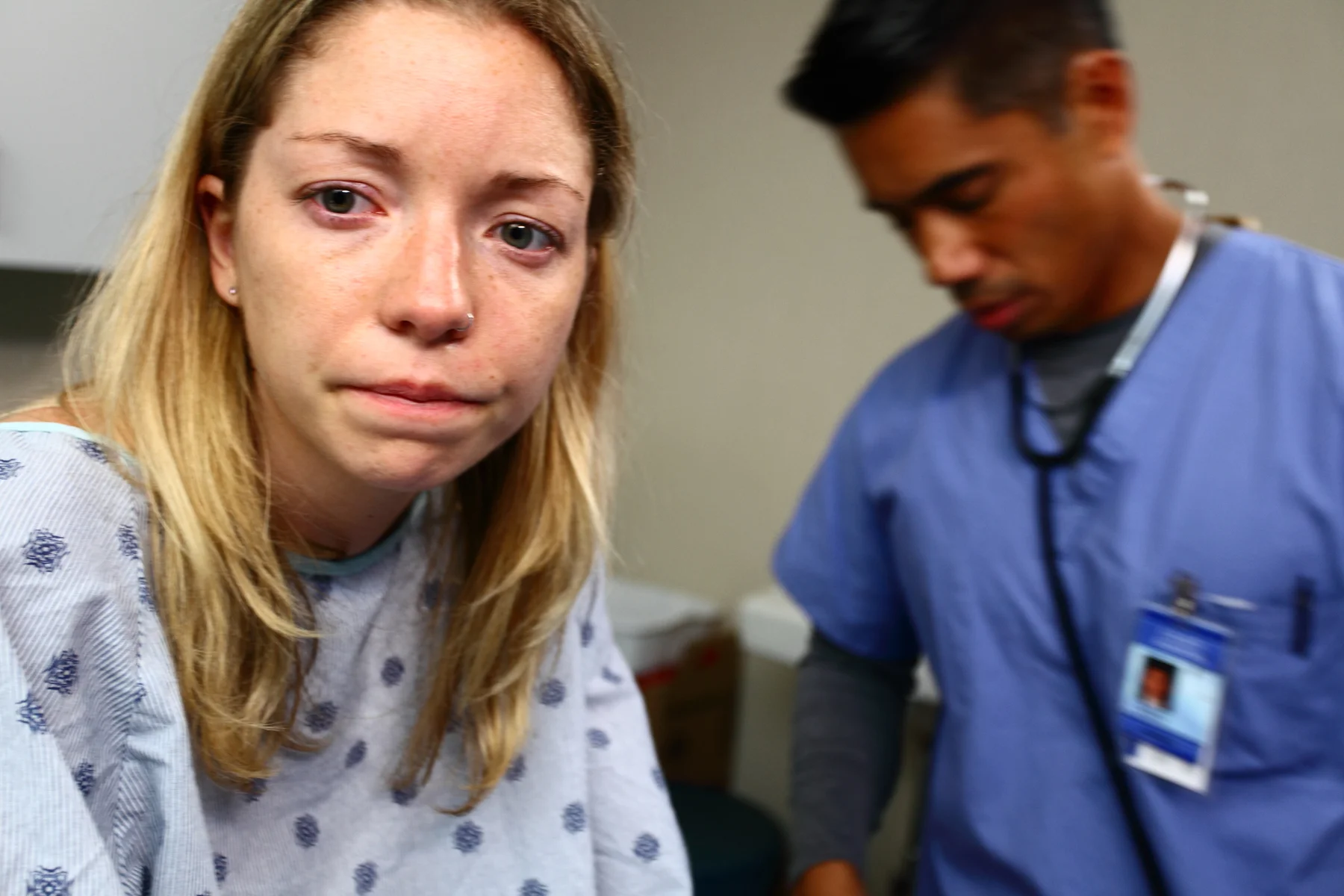 *8_Jackie (Lacy Marie Meyer) is examined by Dr. Yim (Neil Bagadiong) in SUCK IT UP BUTTERCUP.jpg
