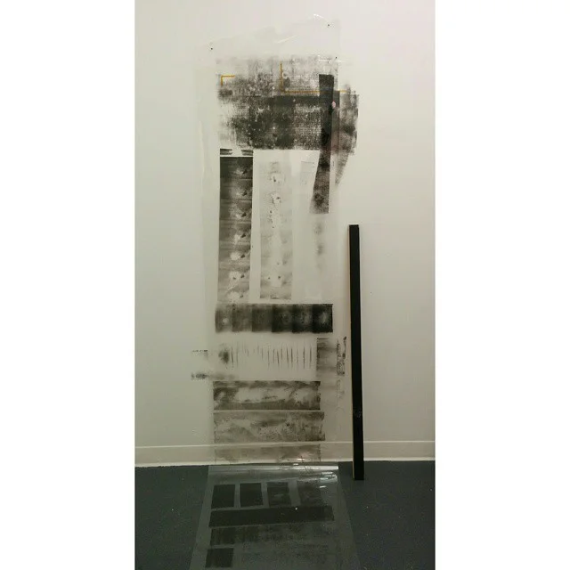 Untitled Multi-pieced ~2 ft x 12 ft, 3ft piece wood leaning, durlar, oil based prink making ink, and amber heat treated tape 