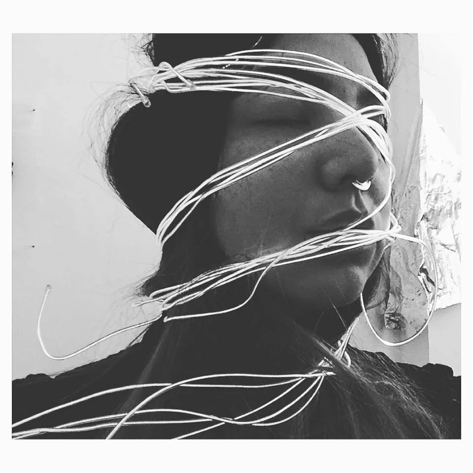 E.L. Tentacles self portrait with E.L. wire