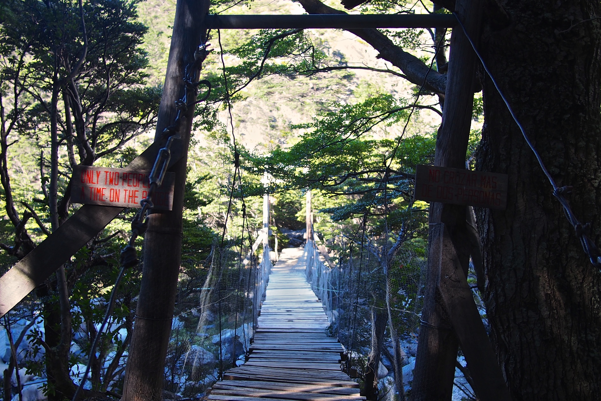This swingbridge meets you right before you reach Campo Italiano, but don't let the picture fool you: winds blast down the river and toss the bridge around as you work your way across. It was on this same river that Tyler lost his balance and took a firm step in the freezing cold water. Sign cautions "only two people a time on the bridge".