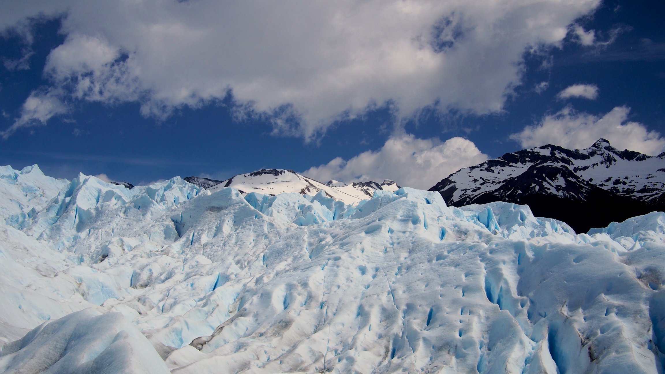 The face of the glacier changes every day due to melting, erosion, and human influence