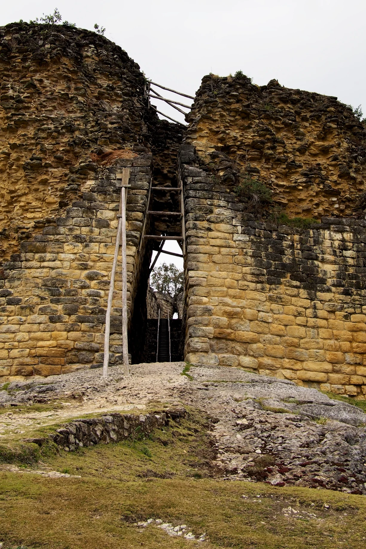 Entrance #2. As you walk in, you can see the marks where the llamas would constantly walk - Kuelap, Peru