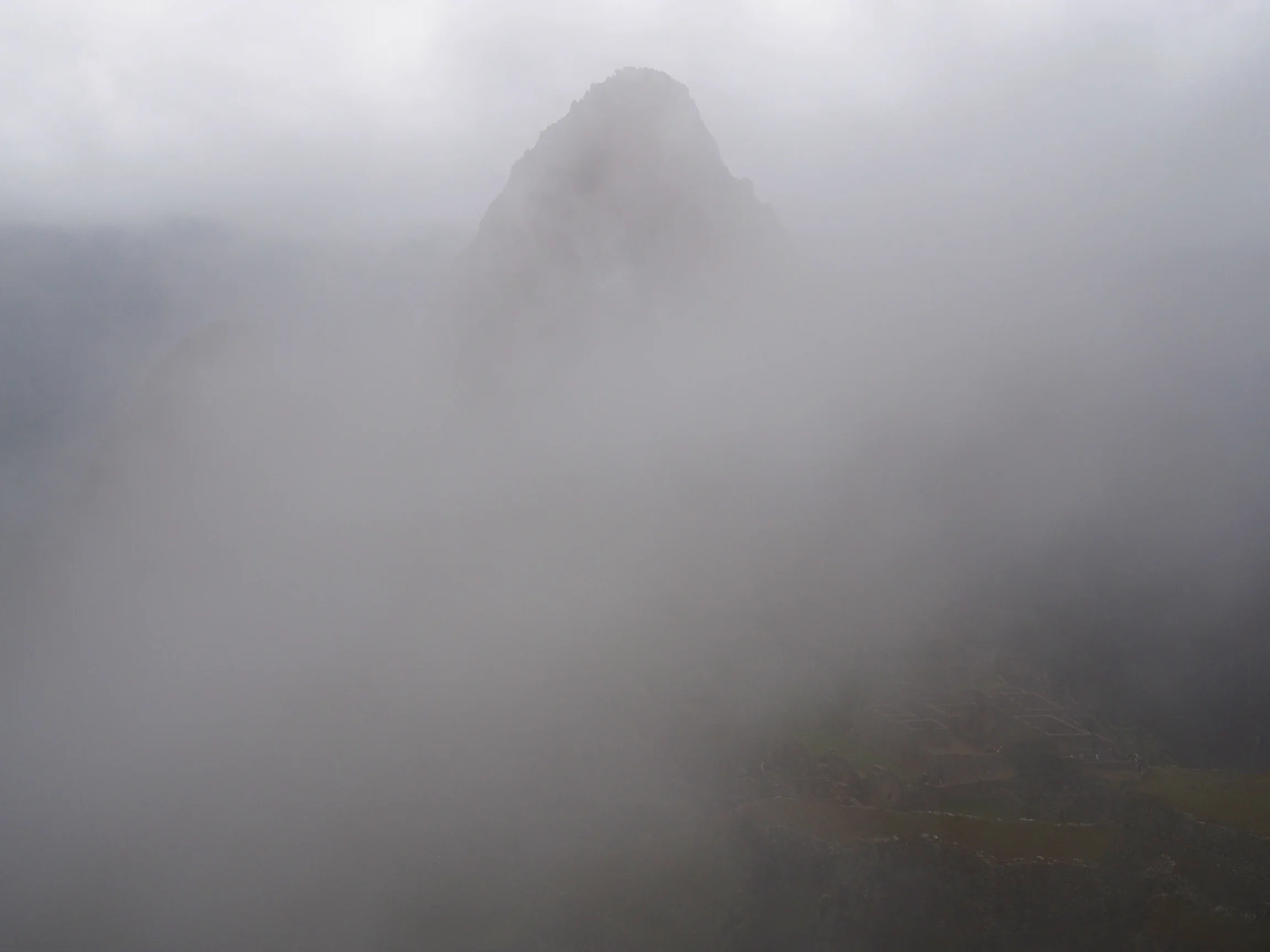 Machu Picchu covered in fog - Machu Picchu,, Peru