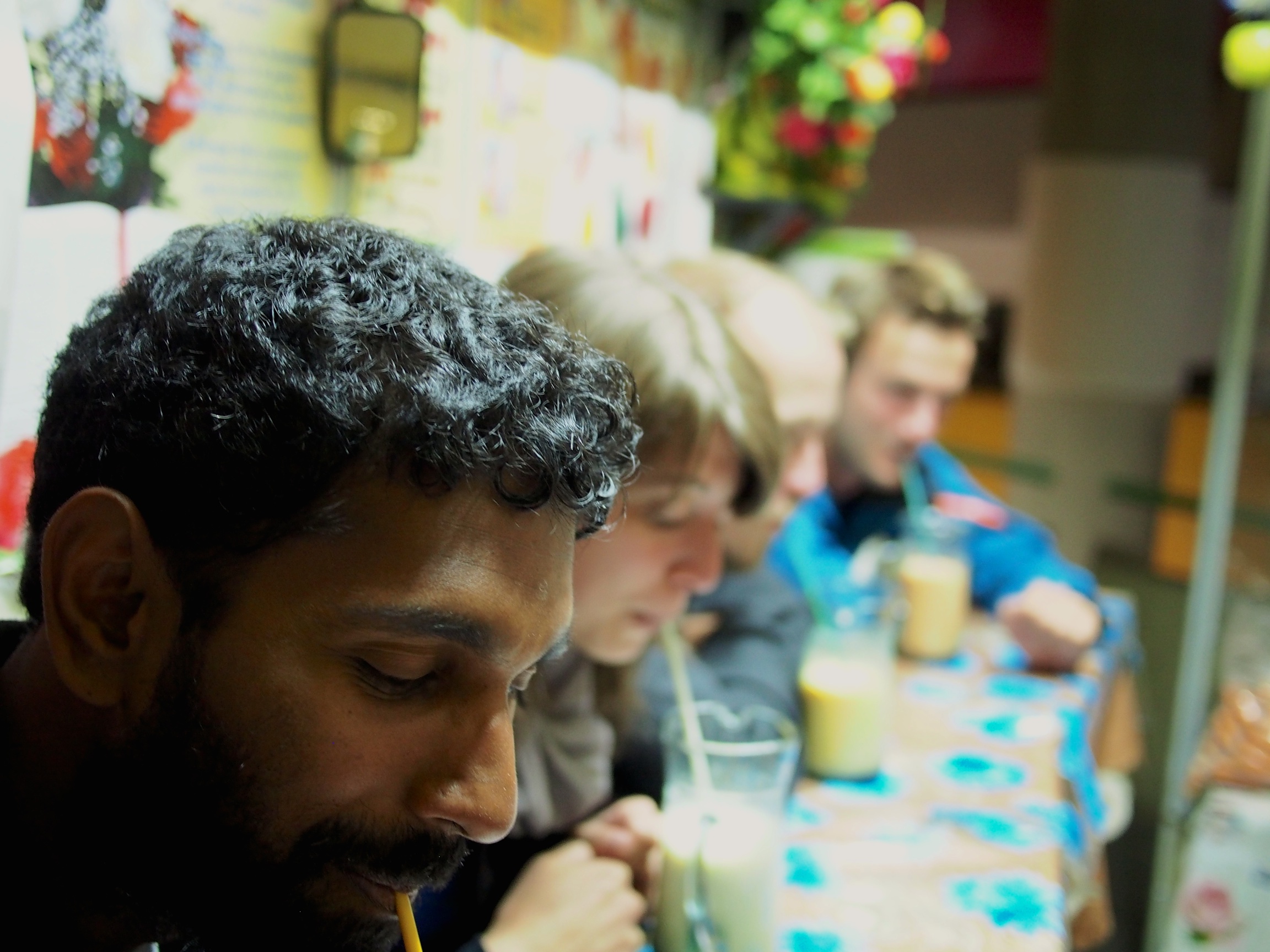 Drinking juice at the market with travel buddies - La Paz, Bolivia