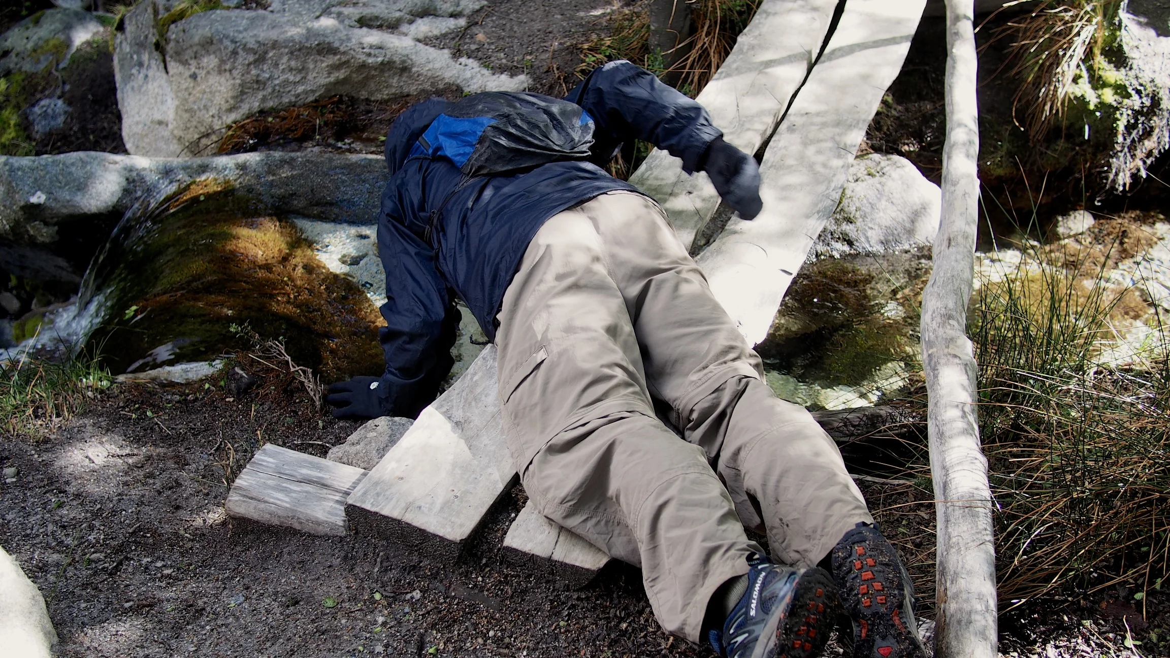 Tyler drinking the pure fresh water like a dog - Torres del Paine, Chile