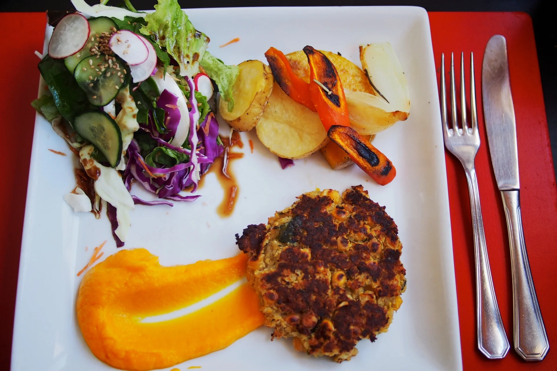 Chickpea patty with roasted veggies, squash purée and a salad from Casa Covita - Bariloche, Argentina