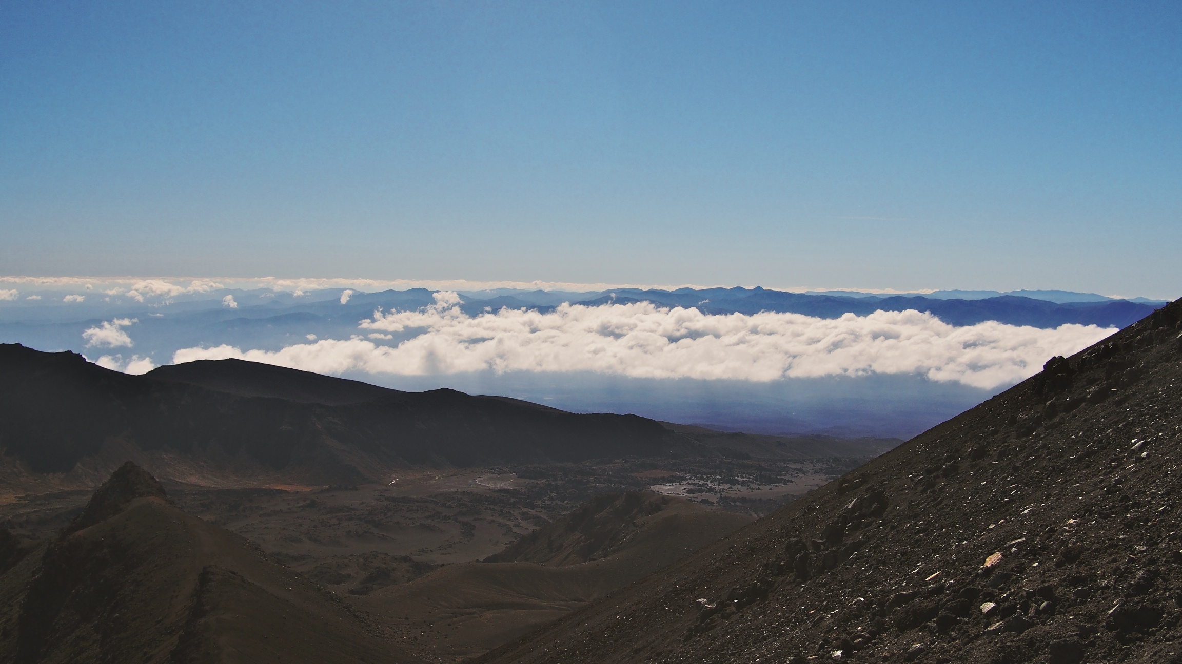 There is absolutely no trail to reach the summit. Just a whole lot of loose volcanic rocks, which make the whole experience slippery and scary. Being above the clouds was a nice reprieve, however.