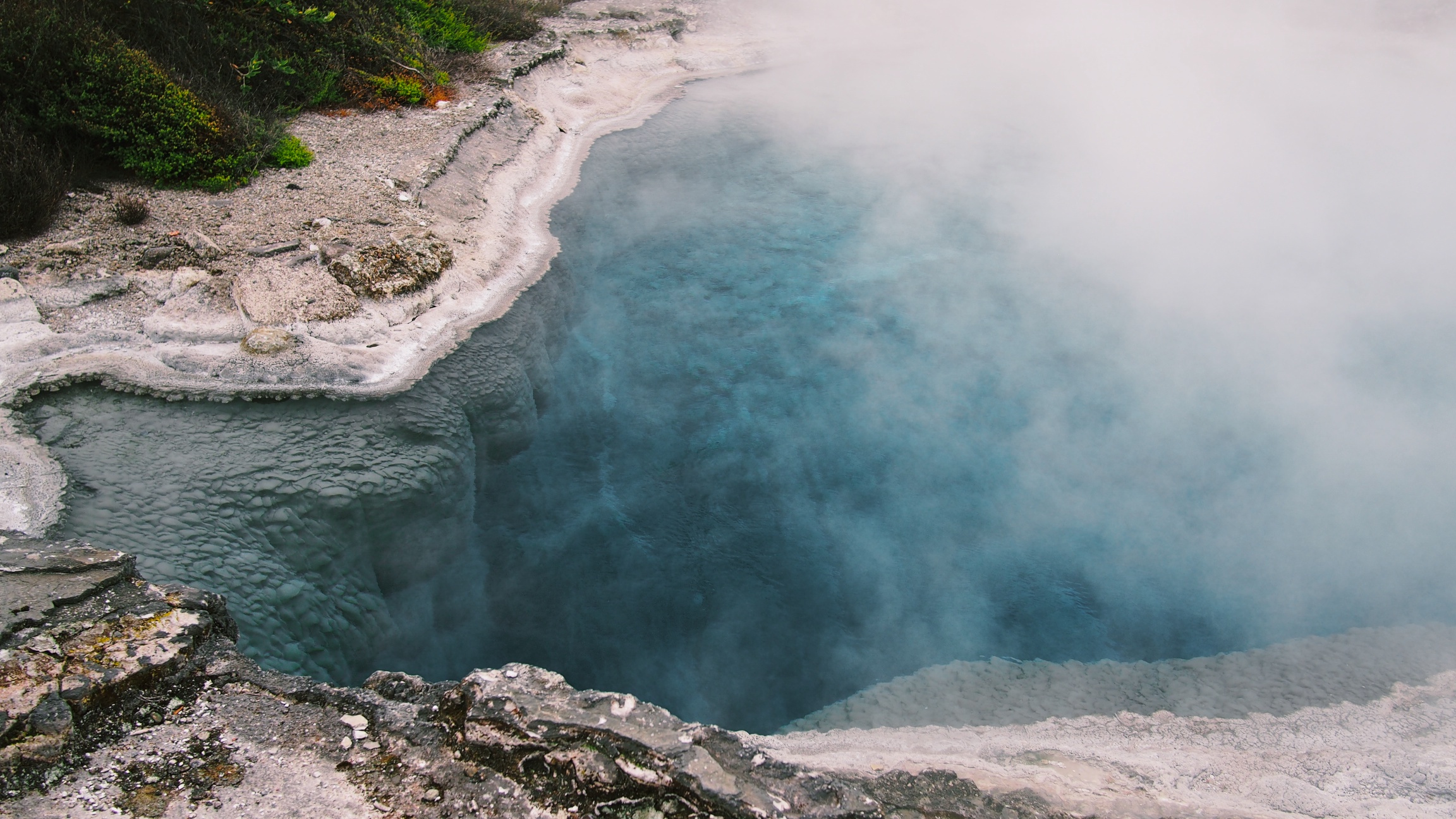 One of the many hot pools on the property