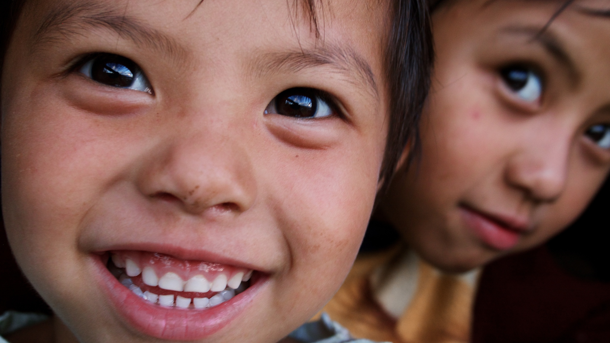 two of the now three children from our homestay
