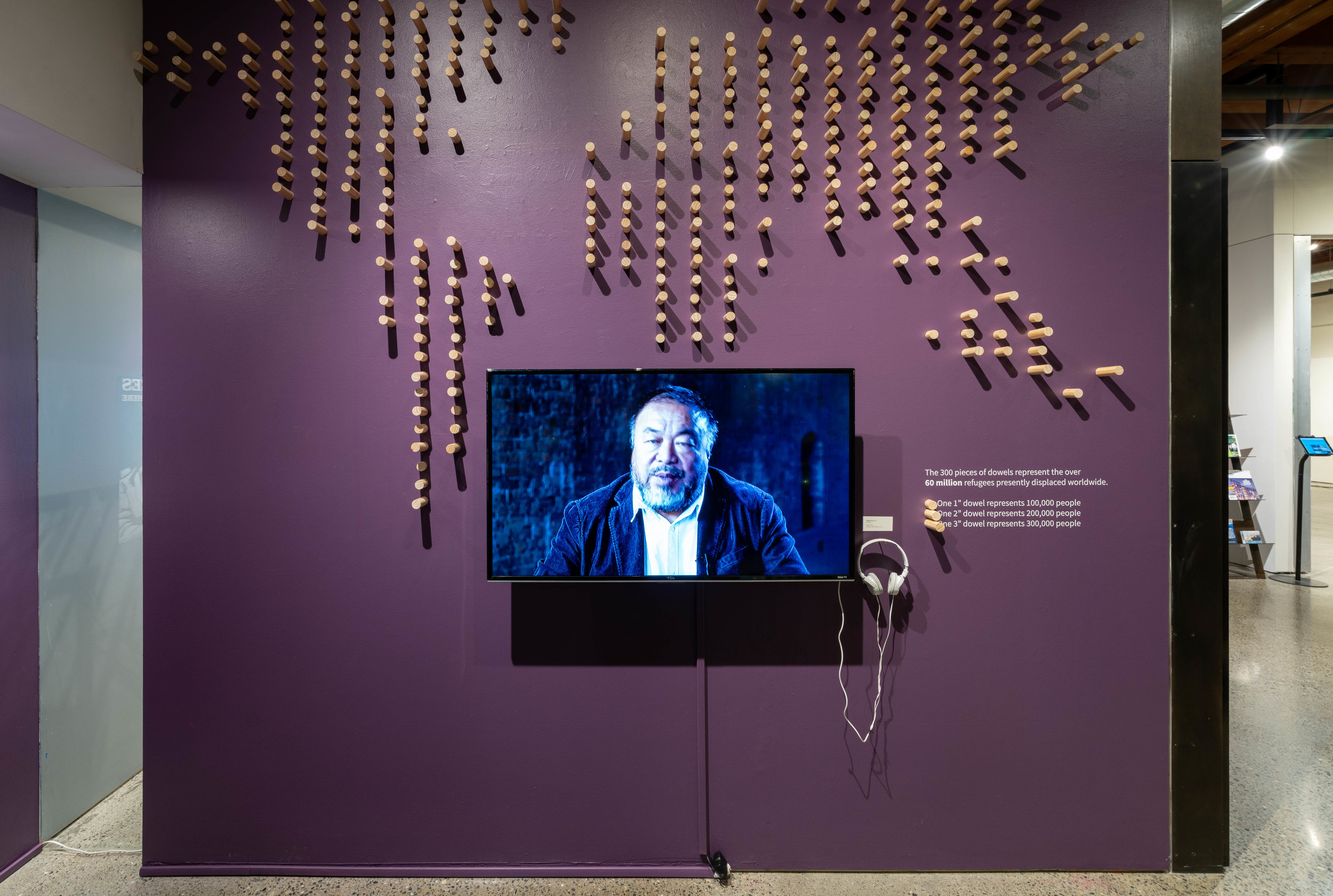 The dowel installation, over 300 pieces, represent the over 60 million refugees presently displaced worldwide in 2018. Below it, scenes from Ai Weiwei’s documentary, Human Flow. Full length screenings were held at the Center.