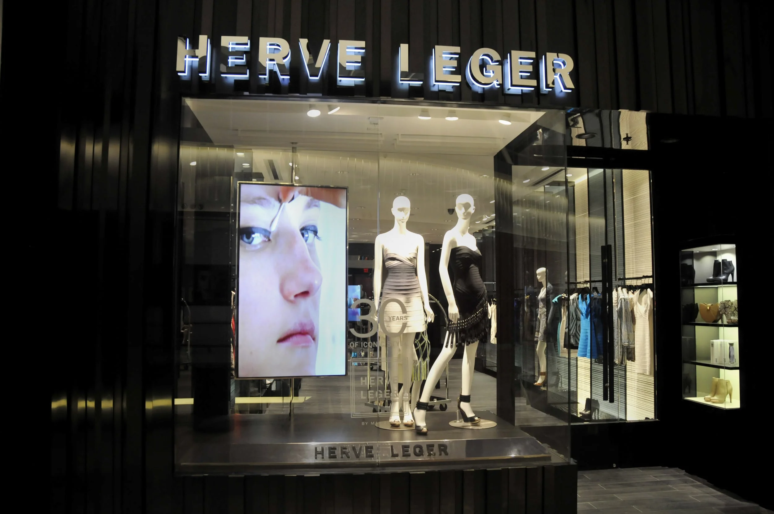  Facade composed of extruded Black aluminum profiles. 