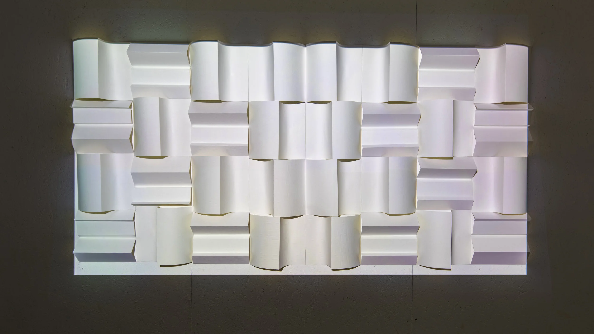 Immensity Without Horizon III, installation view- Treefort Festival, Boise Idaho. 2018. 8ft H x 4ft H x 4in D. 10-minute looped video with an accompanying score, 140lb archival watercolor paper, and adhesive.