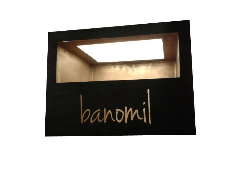A light box indicating the name of each room, the name is written in Tztozil Maya language