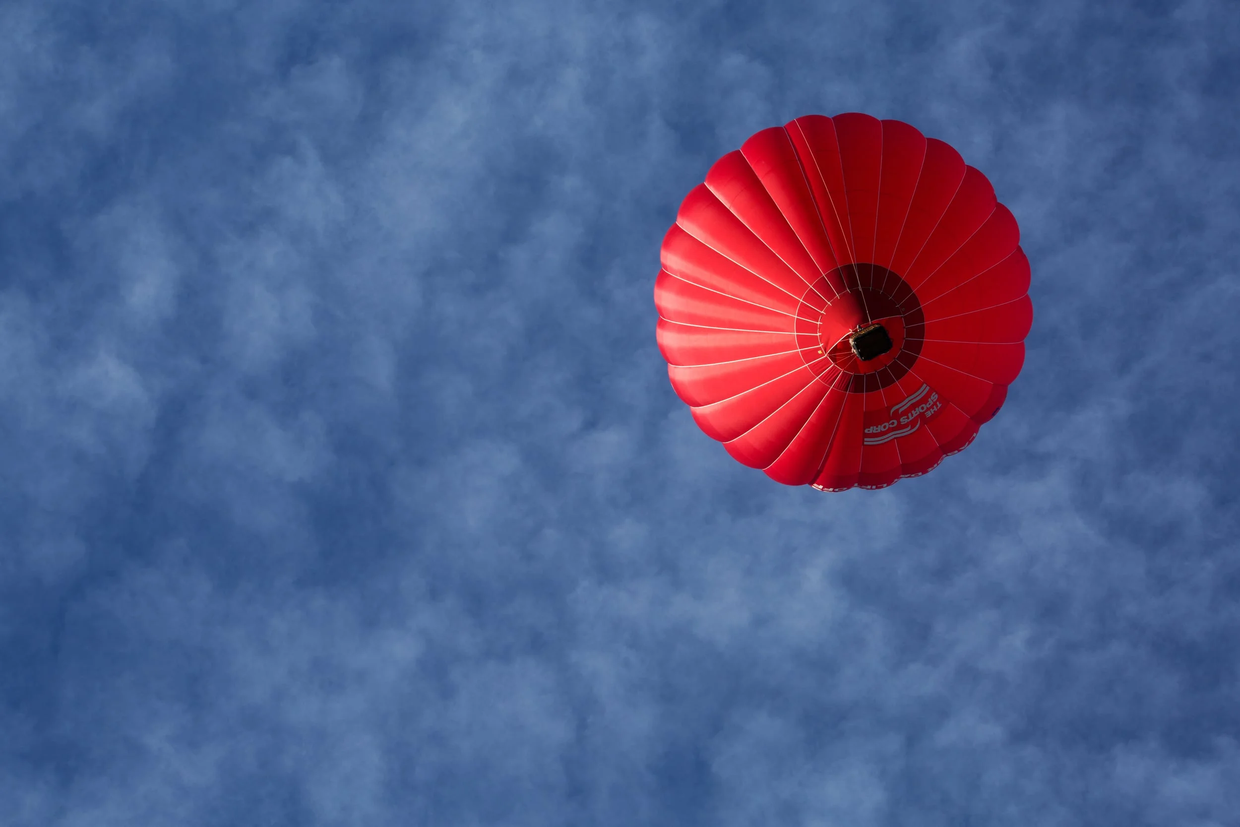 A hot-air balloon floats over Colorado Springs, Colorado.