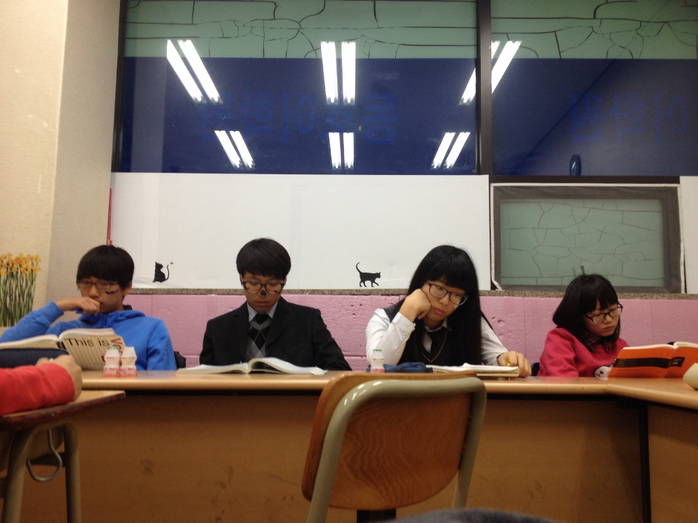  My oldest students aren't so impressed with their face paint (L-R: David, Alfred, Celia, Liz) 