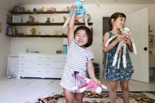 two girls and monkeys .jpeg