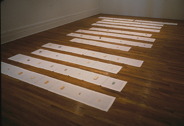 Homage to Francis
Ponge, 1989-1991. Soaps stolen from public bathrooms, linen runners, text. Dimensions variable