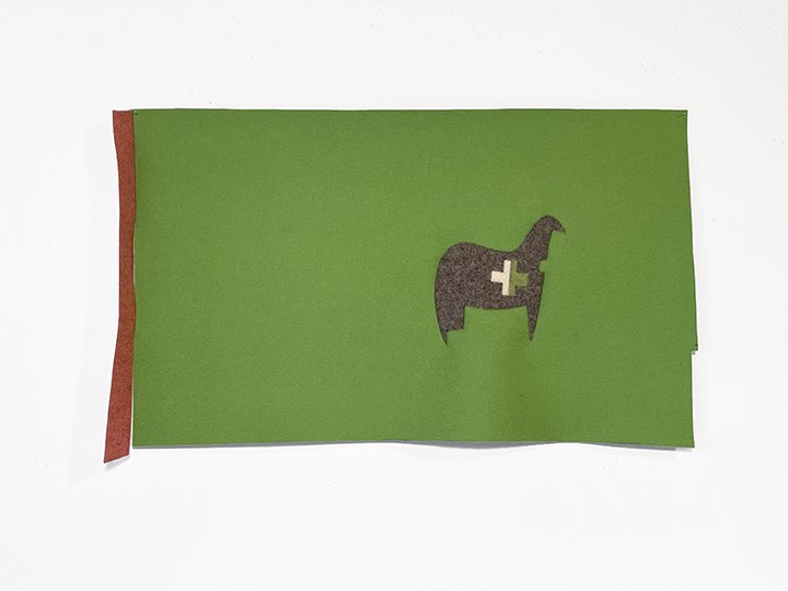   No I like flags 25 (creature/green),  2023. Industrial wool felt hand stitched with silk thread. 21" x 36" 