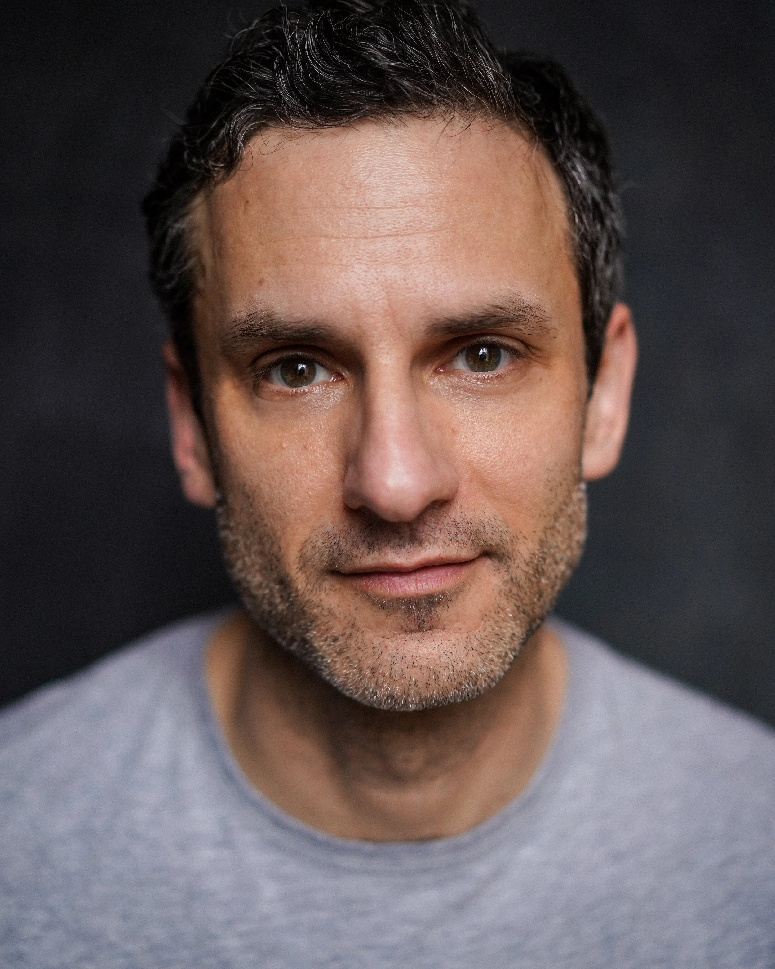 Eli James headshot 1 (gray t shirt) high res.jpeg