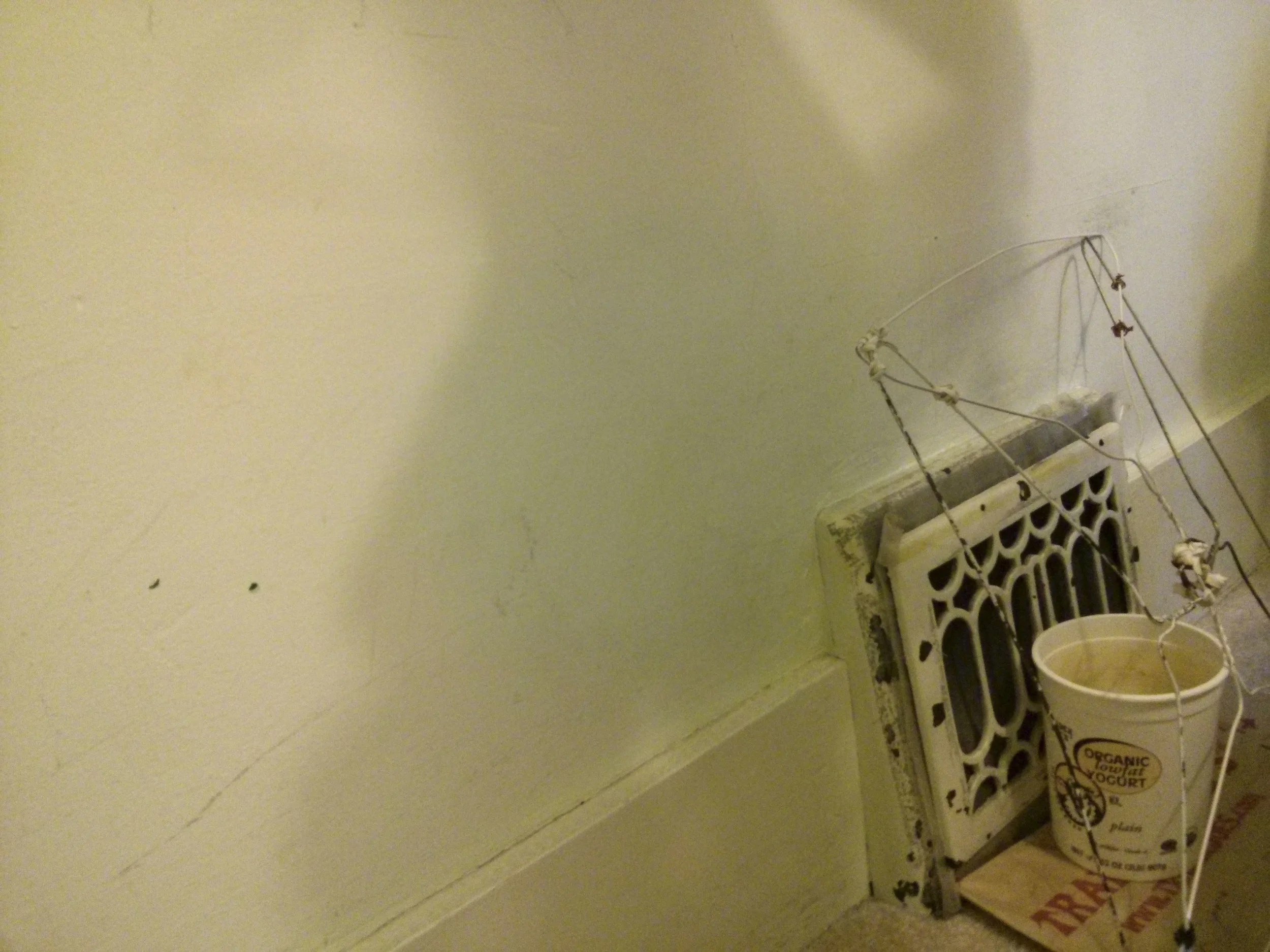 4 coat hangers interlock to create a small drying rack for socks and face towels