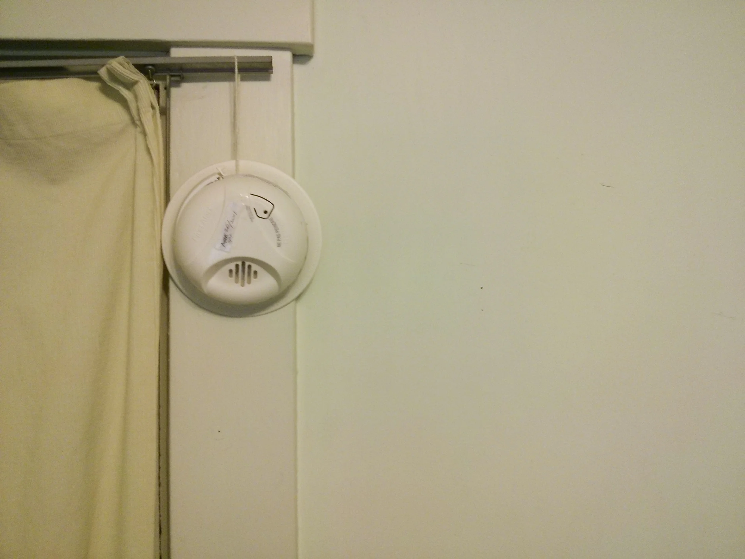 To prevent any ladder-related accidents from happening, smoke detectors are placed within arms reach at the top of doorframes