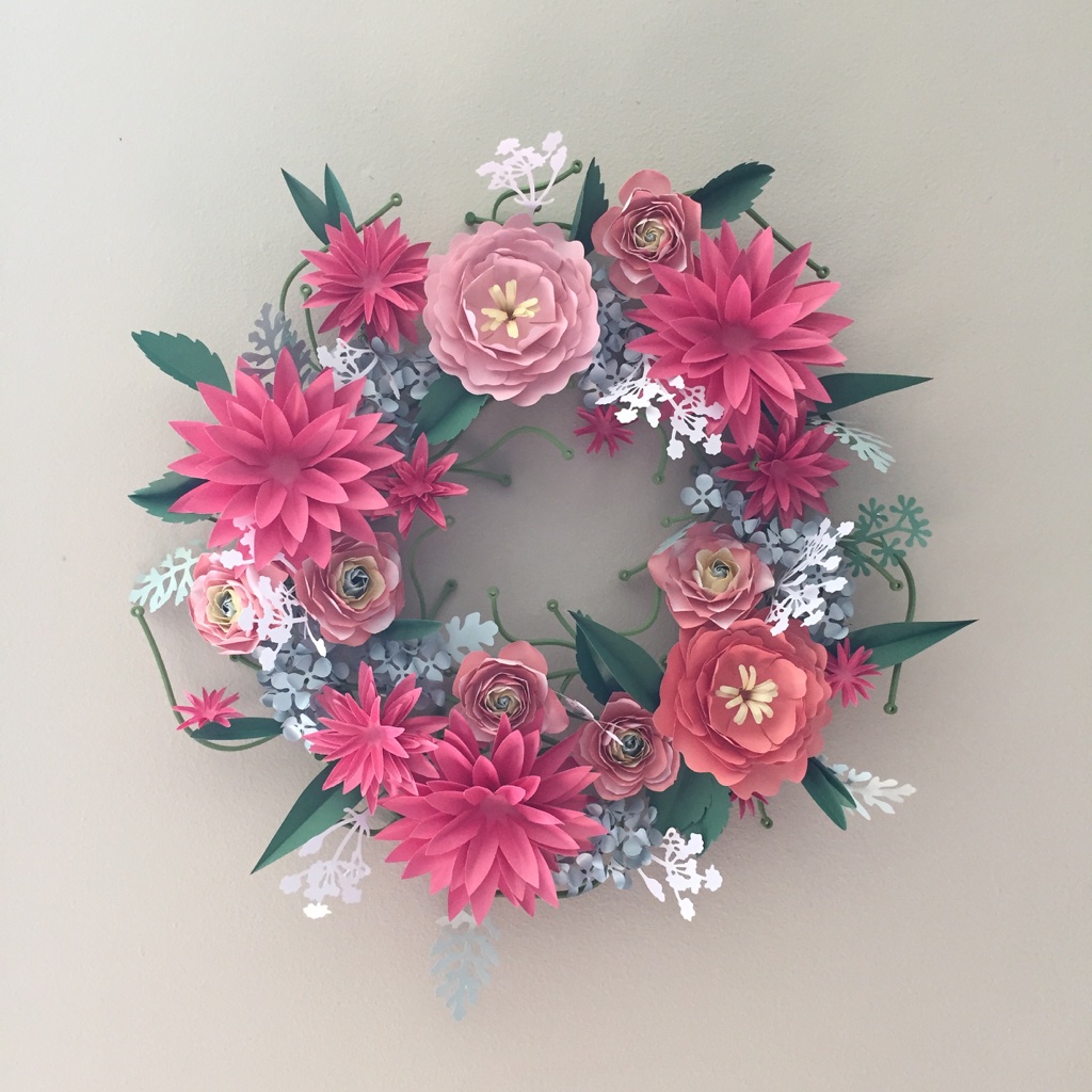 Paper flower wreath assembled from various kits