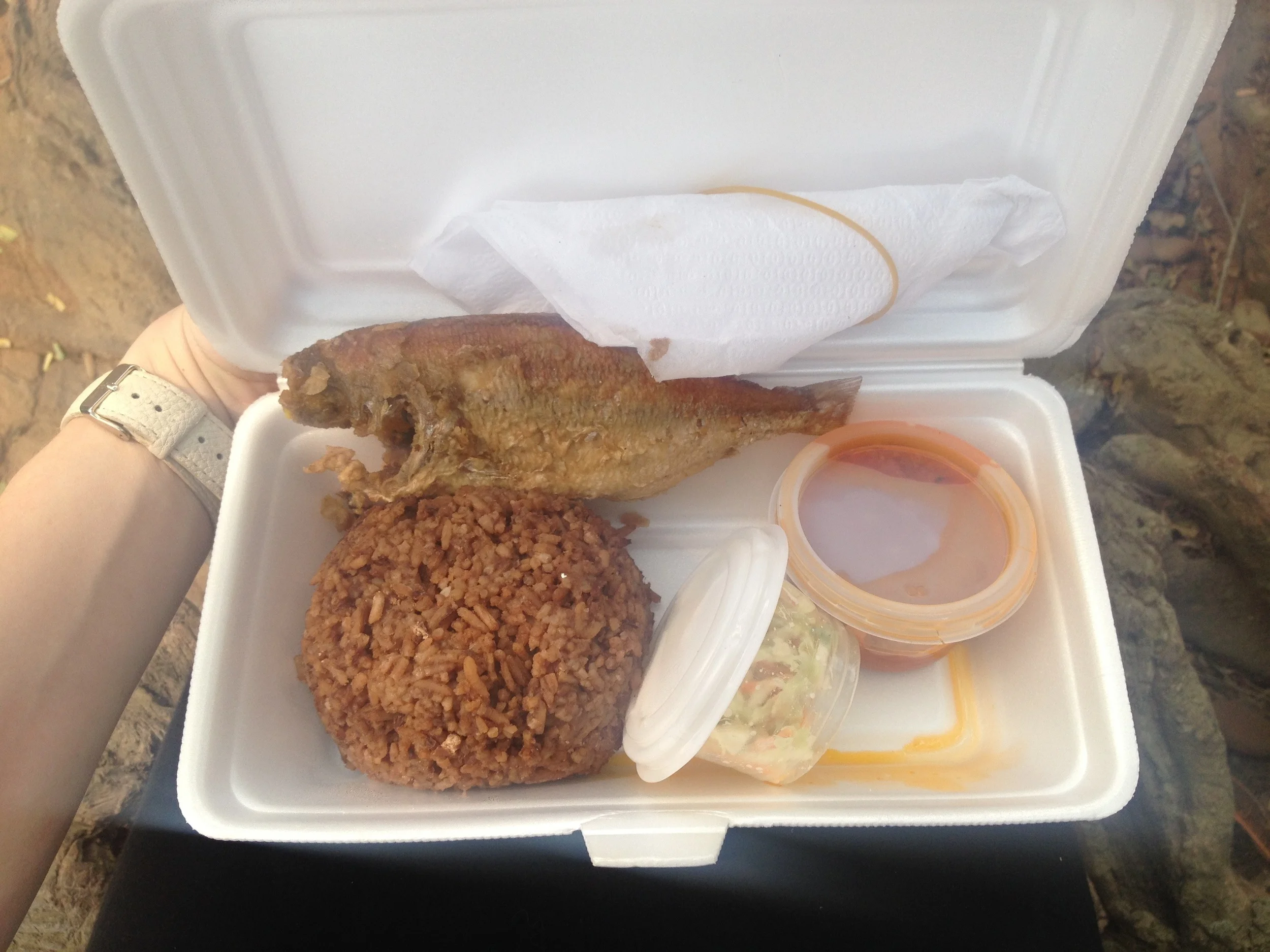 The everyday lunch. Jollof rice with fish. I've learned how to debone a fish quickly. Most Ghanaians just eat the bones. They're intense.