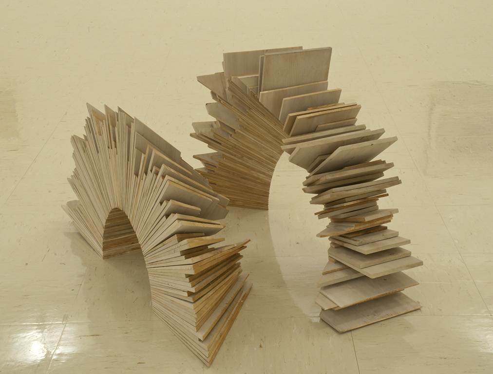 Arched, 2010 Cedar shingle tips and house stain (leftovers from job construction sites) Two in a series of six. Smaller arch: 18" x 8" x 18" Larger arch: 20" x 8" x 18"