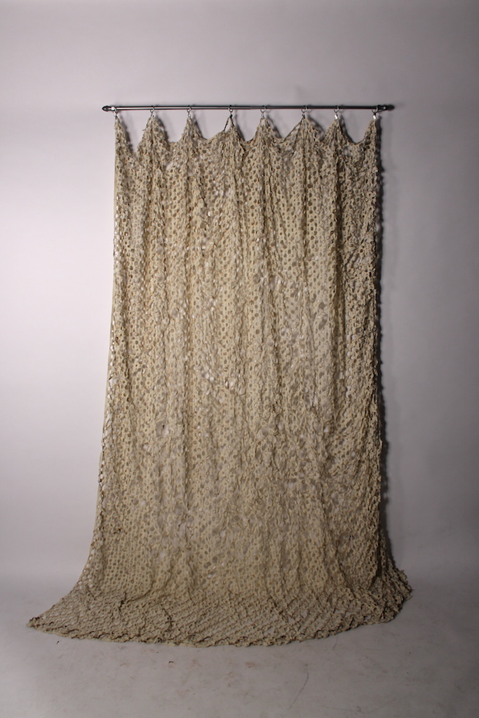 AUDREY D'ASTOUS Bleach and burn , sleeping through a field of (w)hole flowers , 2014. Bed sheet, bleach, curtain rod, 96 x 47 inches.