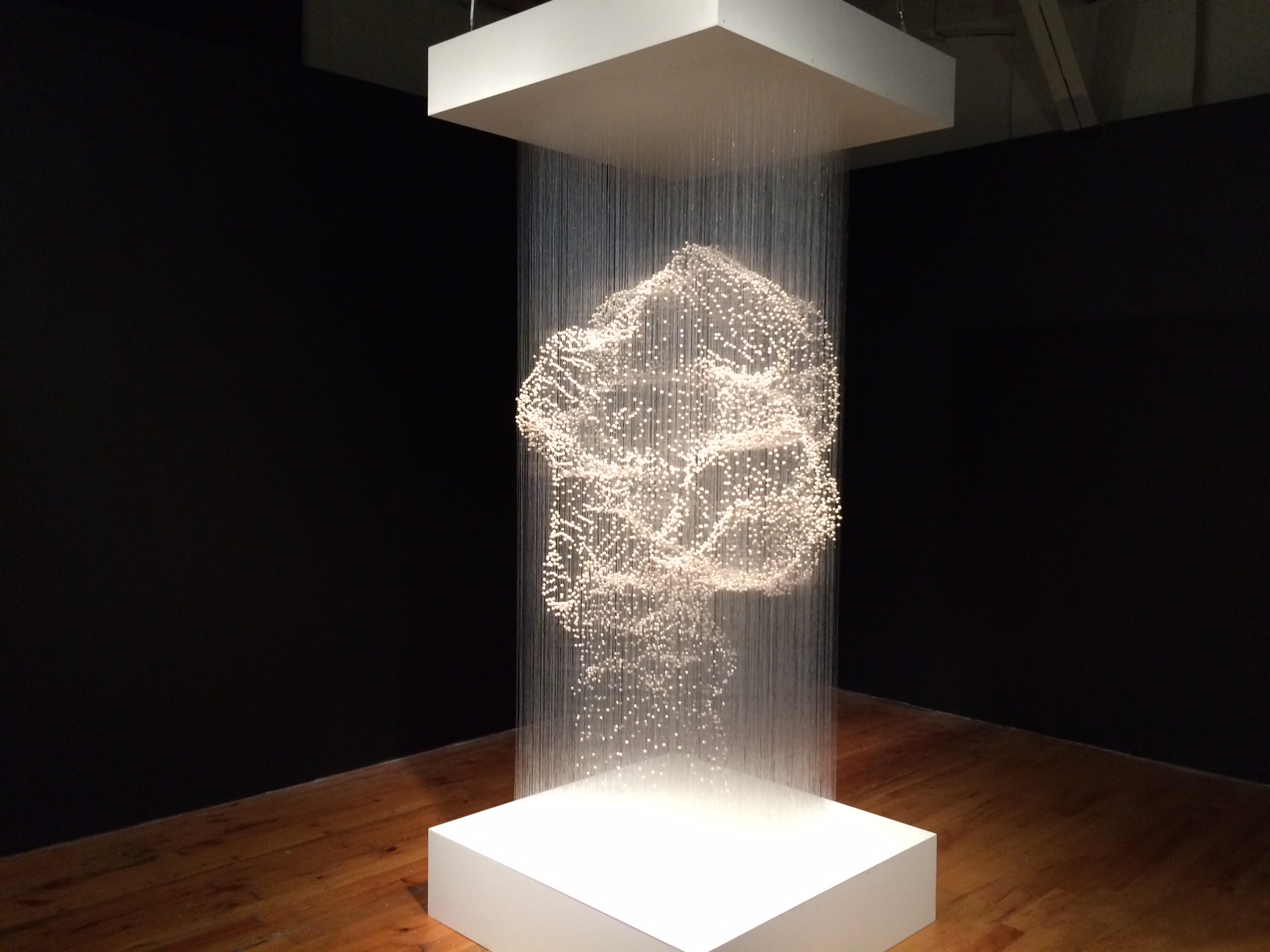 XIAOJING YAN Cloud Cell, 2014. Freshwater pearls, monofilament thread, aluminum, 96 x 45 x 45 inches.