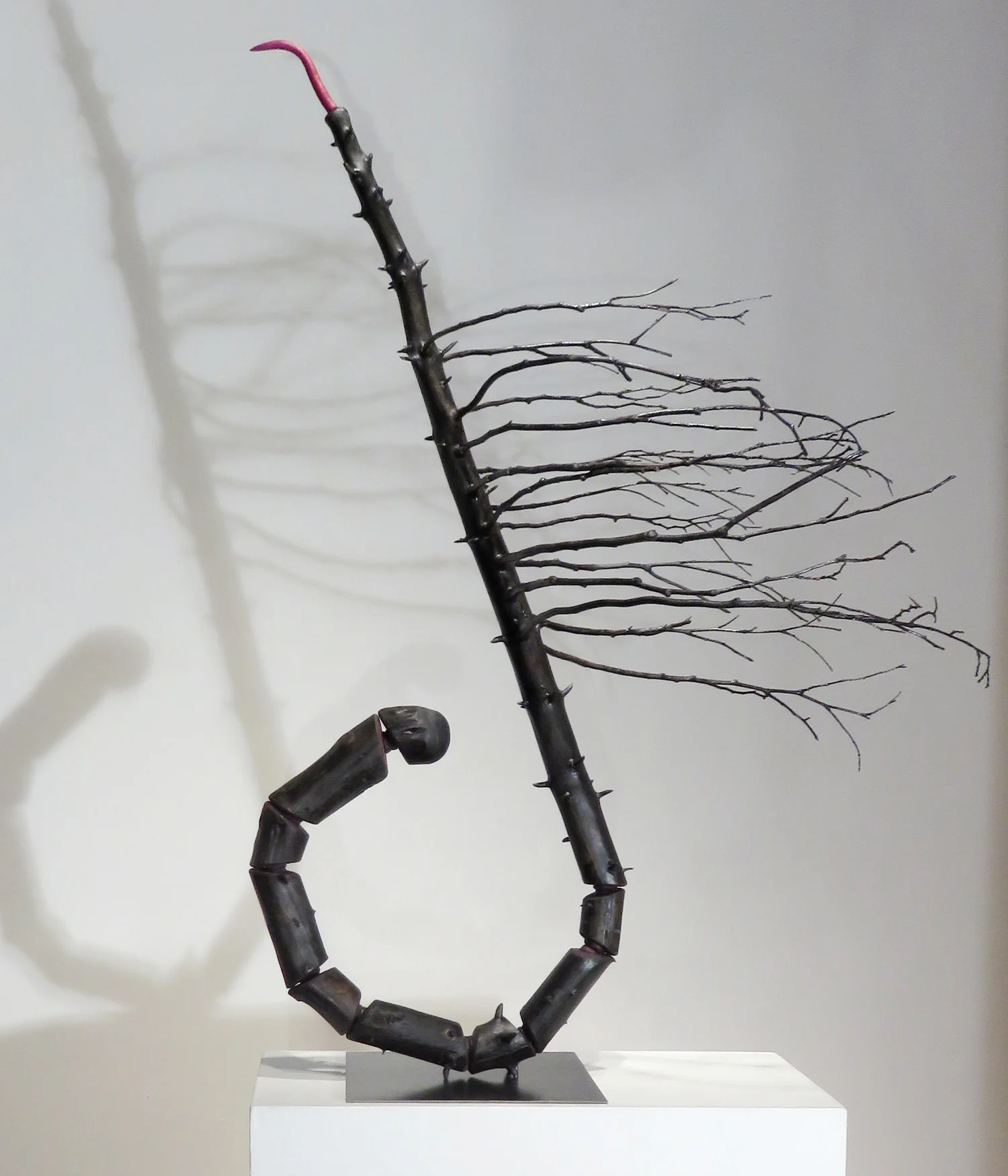 Expectations II, 2016 Spruce tree, cedar branches, foam, acrylic paint, steel base 50" x 38" x 28"