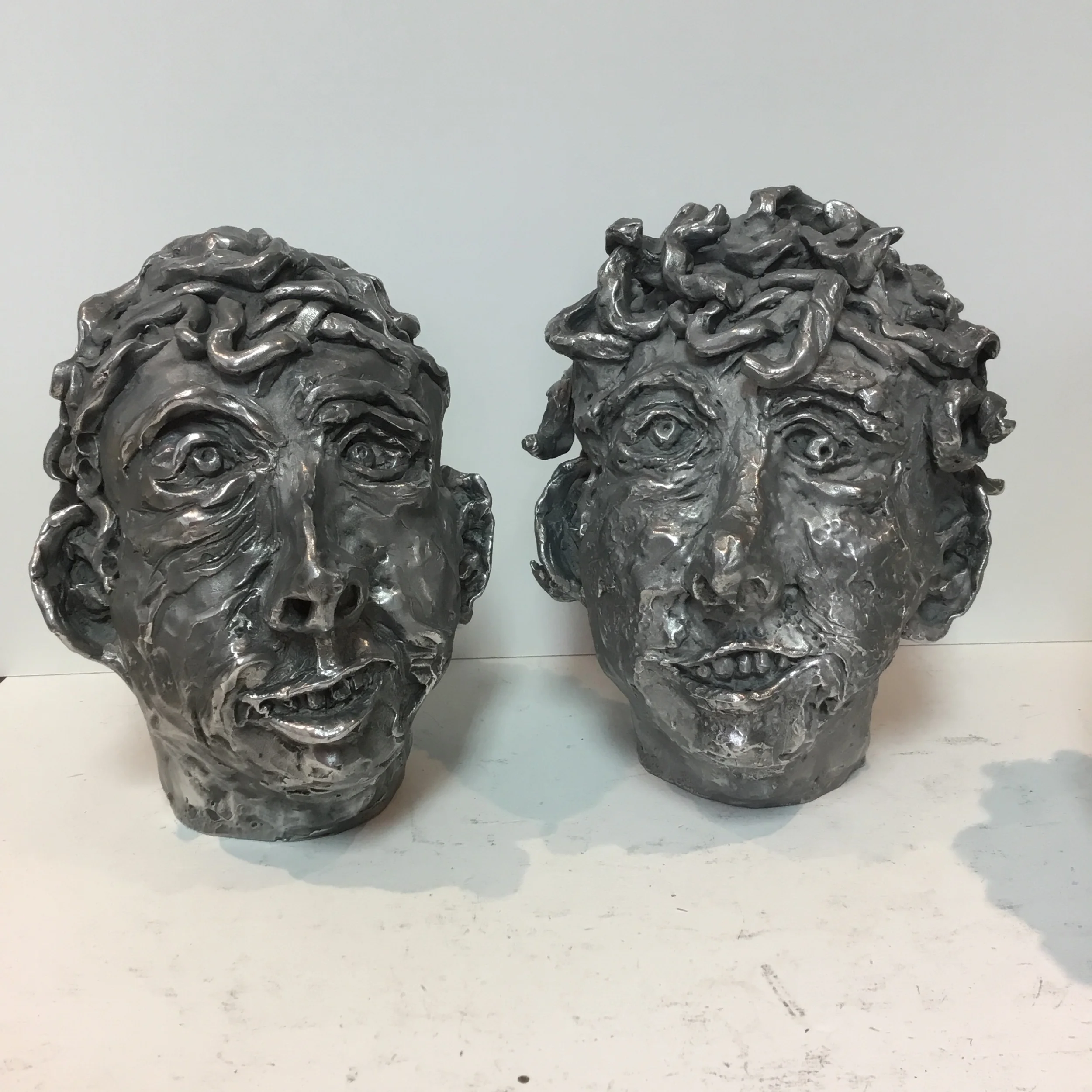   Two heads,&nbsp; 2017 Moulded aluminum 10.5" x 10" x 8" 
