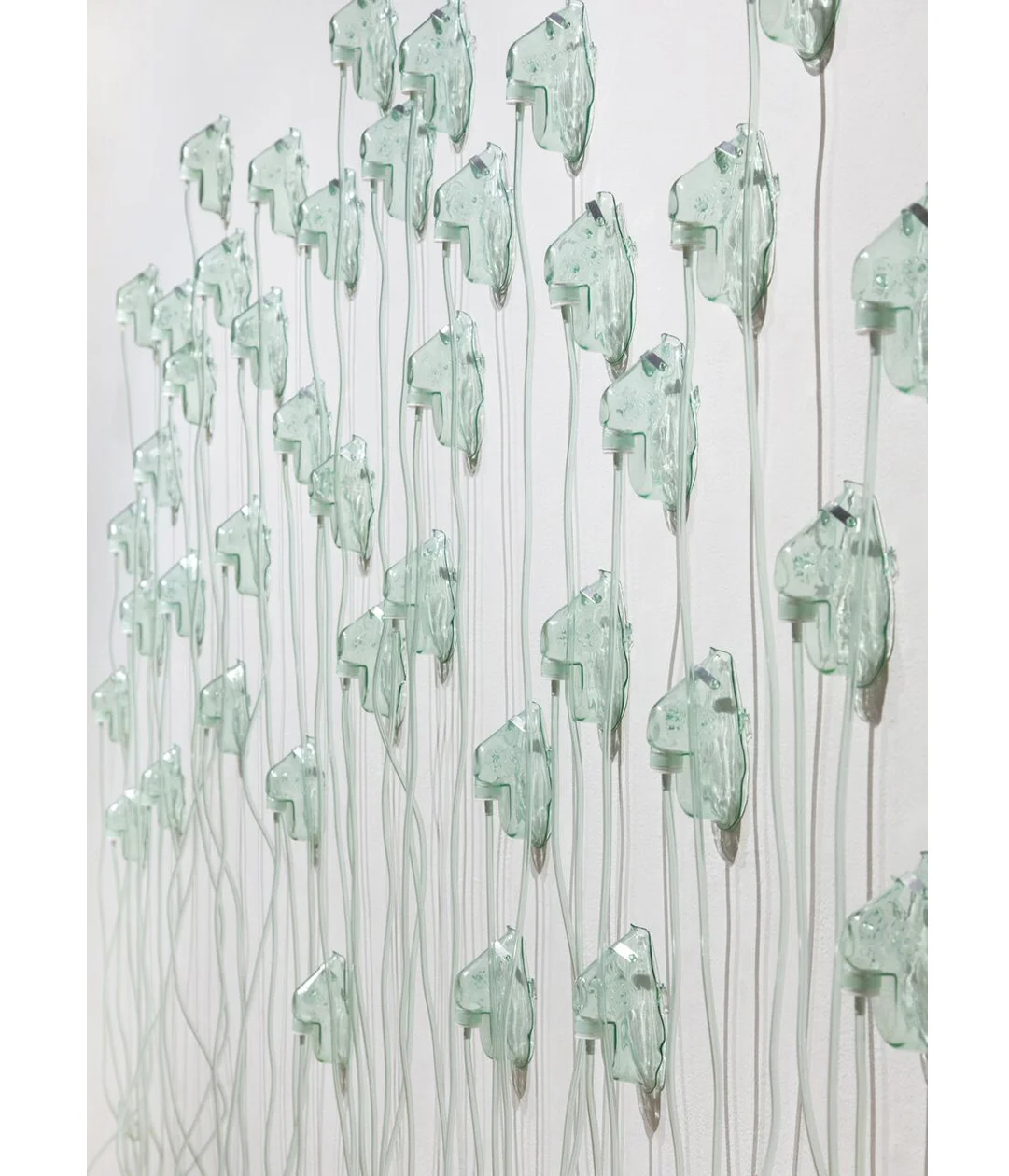 Fraught Air, 2018 Oxygen masks 150”x 96”x 3”
