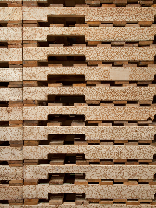   My Place is Placeless  (detail), 2013  Laser-etched wooden pallets 10’ x 12’x 40” 