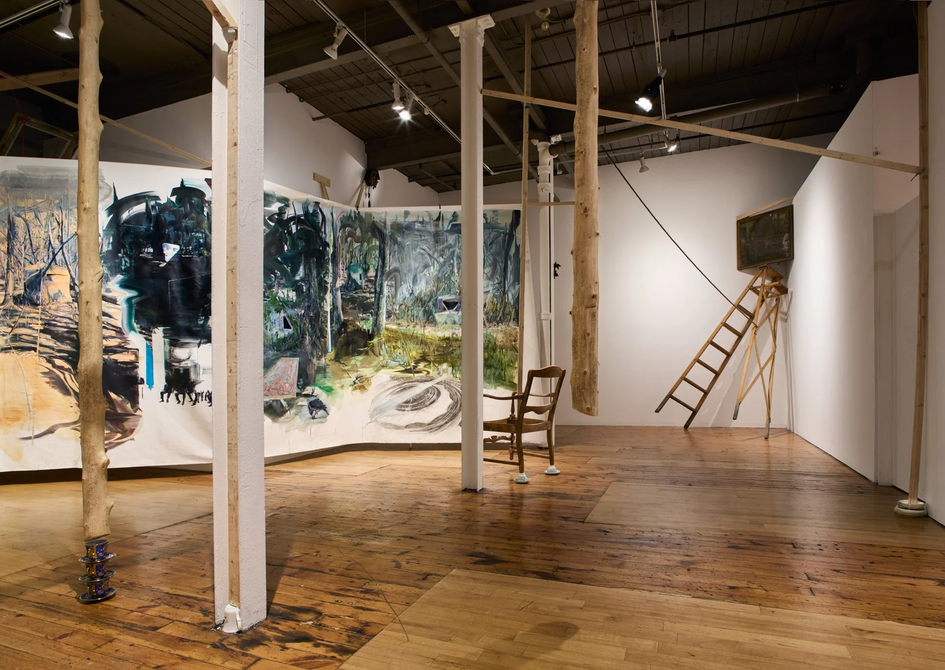   Gillian Iles,“the one-eyed man is king” installation, 180 x 180”, oil, acrylic and pastel on housewrap, 2024  