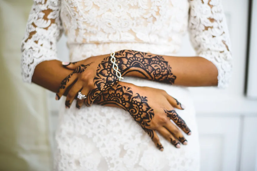 005 sudanese bride with elaborate henna on arms.jpg