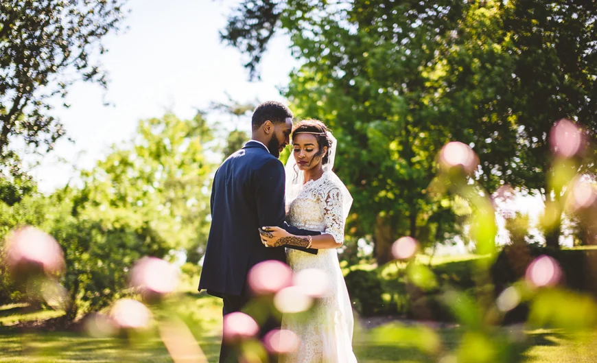 008 Bride and groom with rose buds.jpg